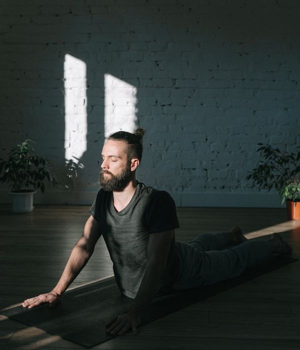 Man focused before a workout session in a calm environment.